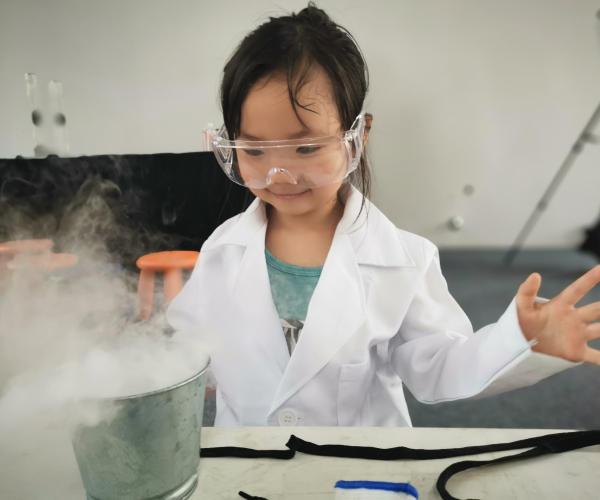 Young girl doing experiments